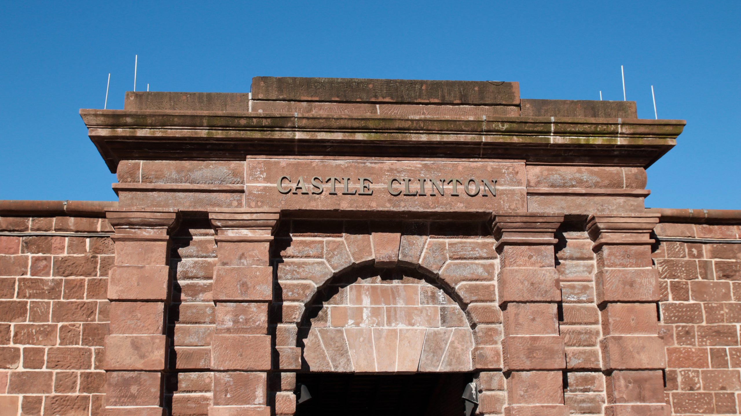 Close up of Castle Clinton sign during Statue of Liberty and Ellis Island Tour