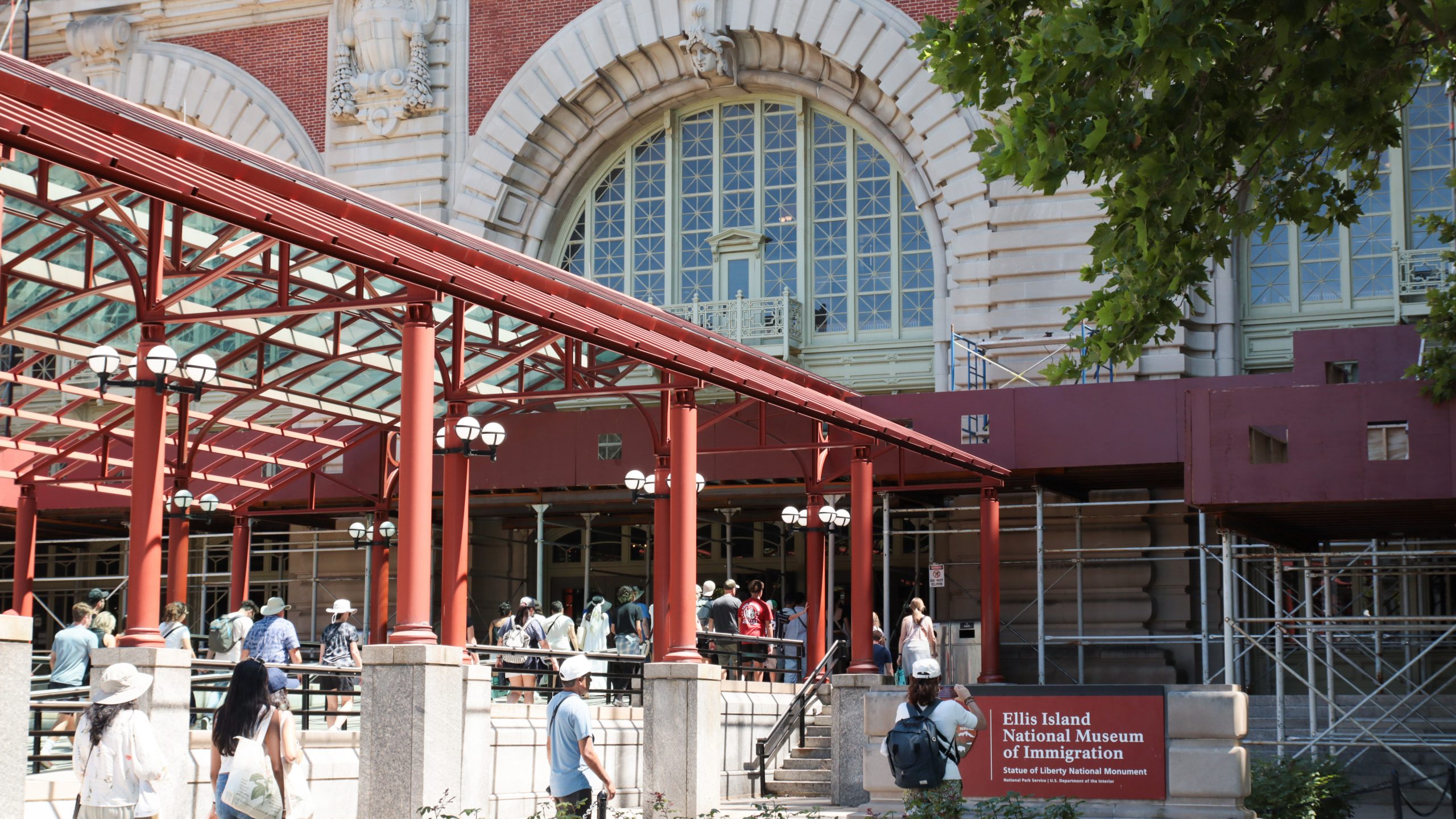 Close up of Ellis Island entrance on a sunny day during Statue of Liberty tour