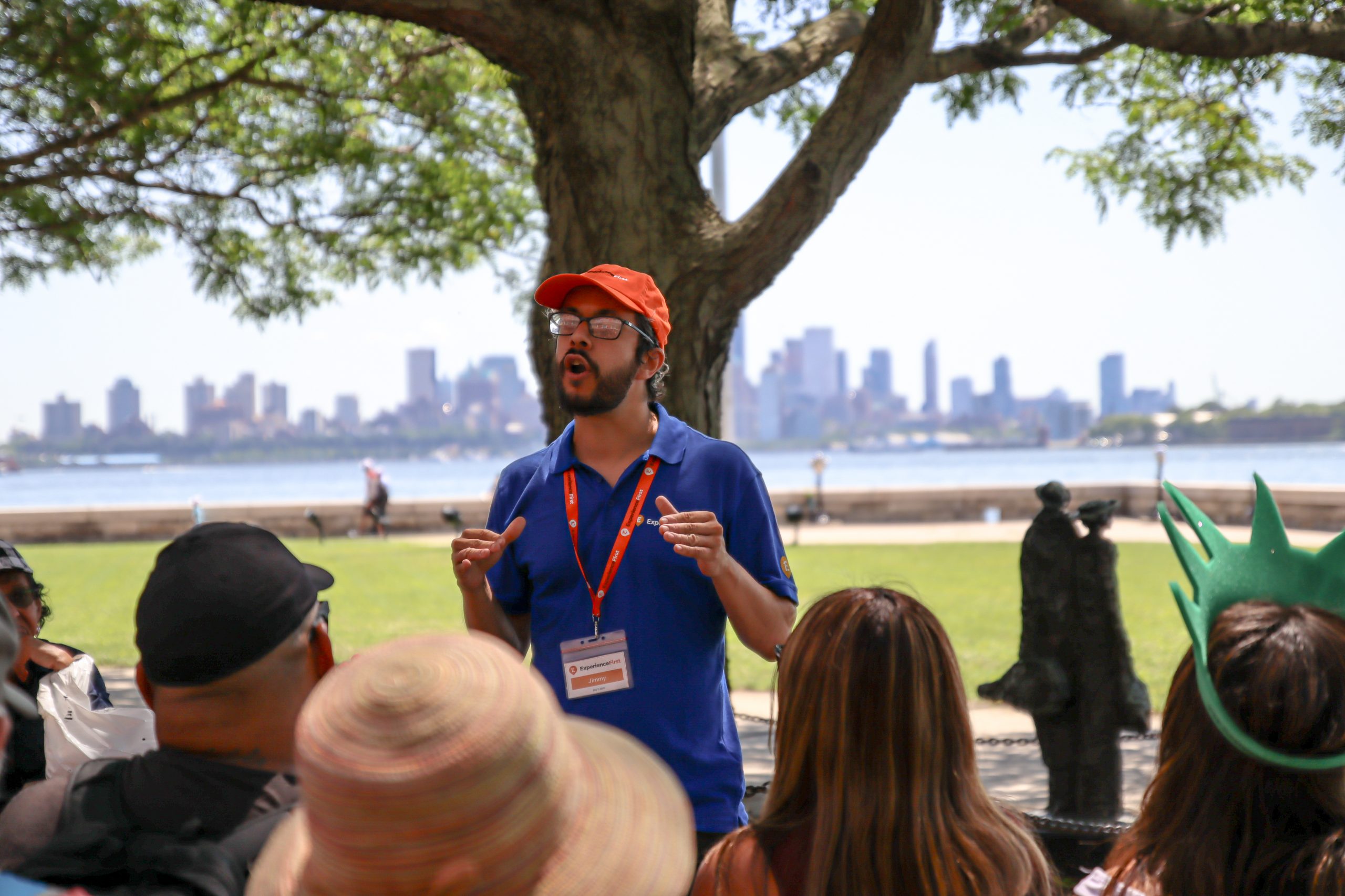 Focused shot of ExperienceFirst tour guide talking to tour group