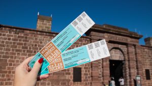 Statue of Liberty and Ellis Island admission tickets close up